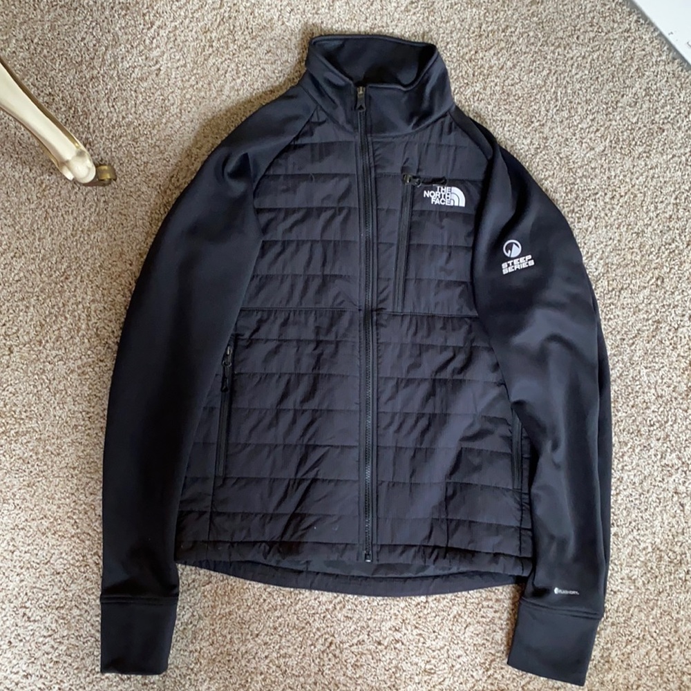 The North Face black jacket.